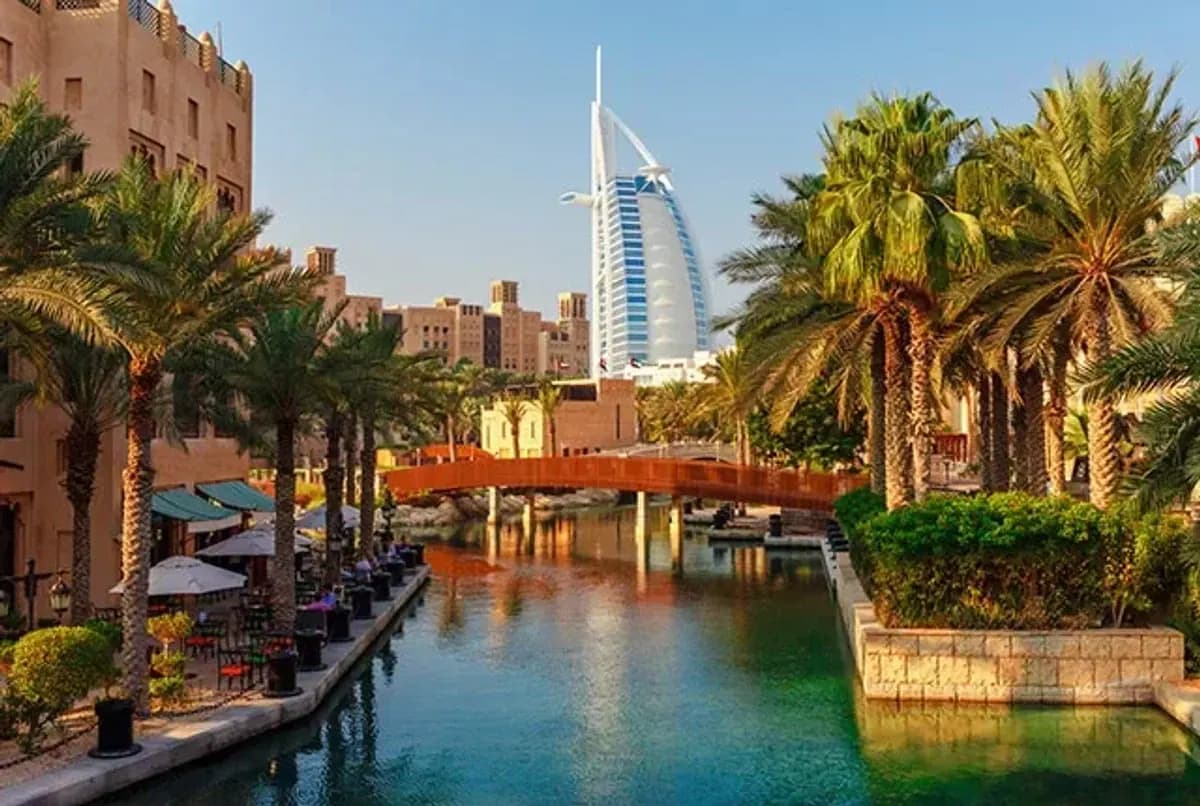 Dubai — Burj Khalifa · the Burj Khalifa piercing the haze above Dubai's skyline